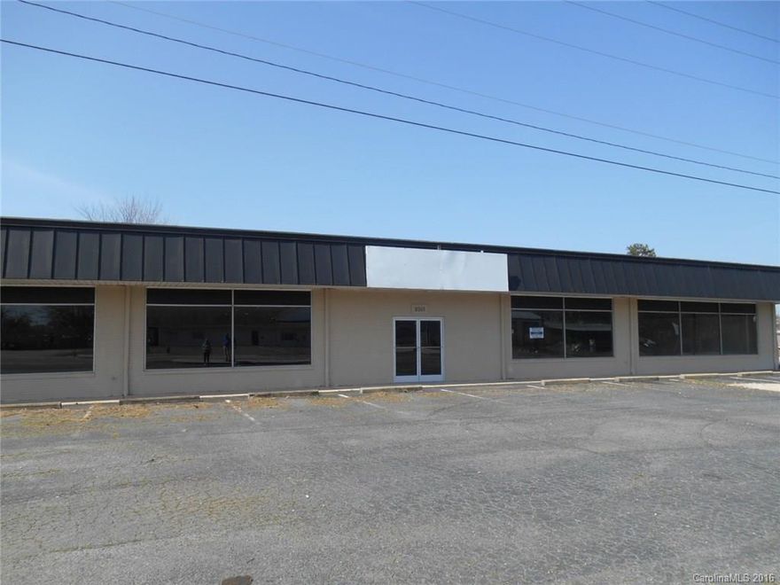 Wanted: Entrepreneurs! This building was formally a furniture/mattress store. Would make a great retail space OR it could be transformed into office space, or even an auto sales/repair shop. Over 8,000 sq. ft. on the main floor, about half that in basement, other half is slab. Approx. 30 parking spaces in front. 2 restrooms, 2 offices. Loading dock, Basement has door out to back alley which runs from block to block, for off street deliveries.
