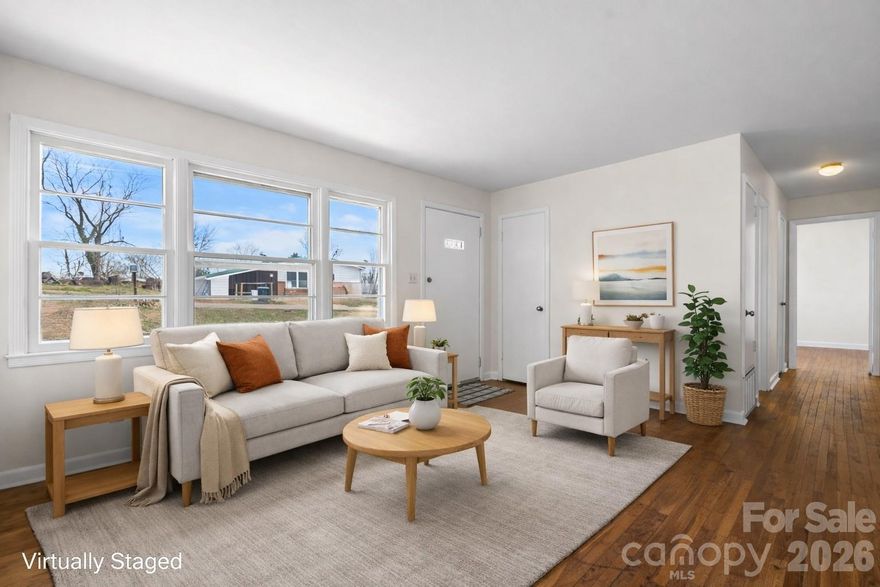 Freshly updated, turnkey 3-bedroom home in Morganton offering move-in ready comfort and long-term value. Features new paint, durable hardwood floors, updated kitchen and updated bath designed for low upkeep and daily durability. Offers strong value for buyers seeking an affordable monthly payment compared to rising rental costs. Includes laundry hookups, 1-car garage, and tall walk-in partial basement with concrete-floor storage/workshop space. Exterior has low-maintenance vinyl siding to reduce ownership costs. Brand-new heat pump / HVAC provides efficient year-round comfort. Located in a convenient location with easy commute and close to major employers, shopping, and services. Also positioned for strong rental, offering income potential for future investment or portfolio flexibility.