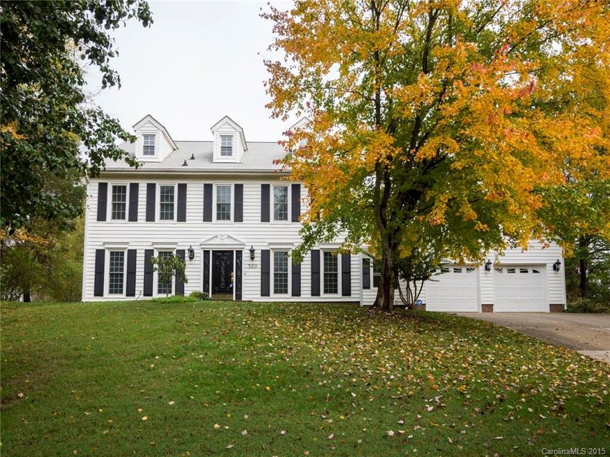 Updated colonial on wooded lot. Low maint. vinyl ext w/newer roof & HVAC. Natural finish hardwd flrs  & tile, no carpet! Remodeled Kit w/granite, stainless, island, & new fixtures/lighting. Spacious great rm w/stone fireplace & access to deck. Large master w/trey ceiling, his & hers vanity areas, jetted tub, tiled shower, & new lighting & fixtures. Sep staircase to bonus rm over garage. Rear deck & patio overlook HUGE bkyd. Amenities incl pond, pool, tennis & more. Located close to I-485!