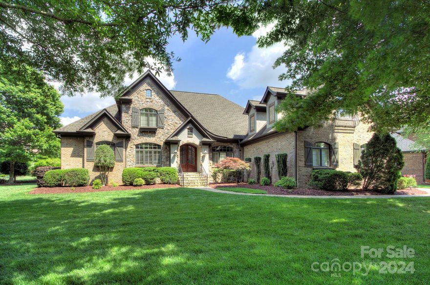 Enjoy luxury living in this beautifully updated custom home within gated Chatelaine. Meticulously designed and maintained. The wow factor starts in the foyer with the grand staircase and moves into the family room with marble wall fireplace, and coffered ceiling. The family room seamlessly connects to the open kitchen and then to the keeping room with a stone fireplace. Enjoy the fully remodeled kitchen with a 48” Wolf dual fuel range, pot-filler, 48” Sub-zero, granite countertops, and huge island with spice racks on the sides and cabinets on the back side. The totally remodeled primary suite boasts a spa-like ensuite with huge shower with body sprays and dry-off area, Victoria & Albert tub, and large vanity with lighted mirrors. Dual staircases lead to the four upper bedrooms, XL bonus room plus a secondary laundry/storage room. The covered backyard patio with a view of the community pond/fountain is great for entertaining/grilling. Weddington schools. Listing Agents are the owners.