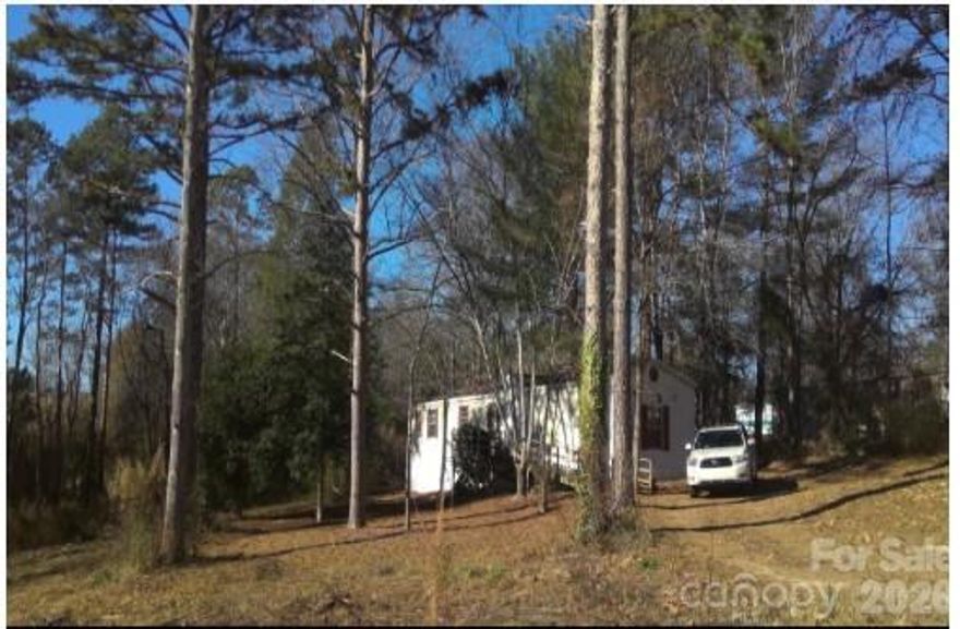 Calling all Investors! This 3Bed/2Bath manufactured home located on Lot #6 is currently leased. 1999 Broo MHP with central air and electric heat pump. Selling Units #2-6.