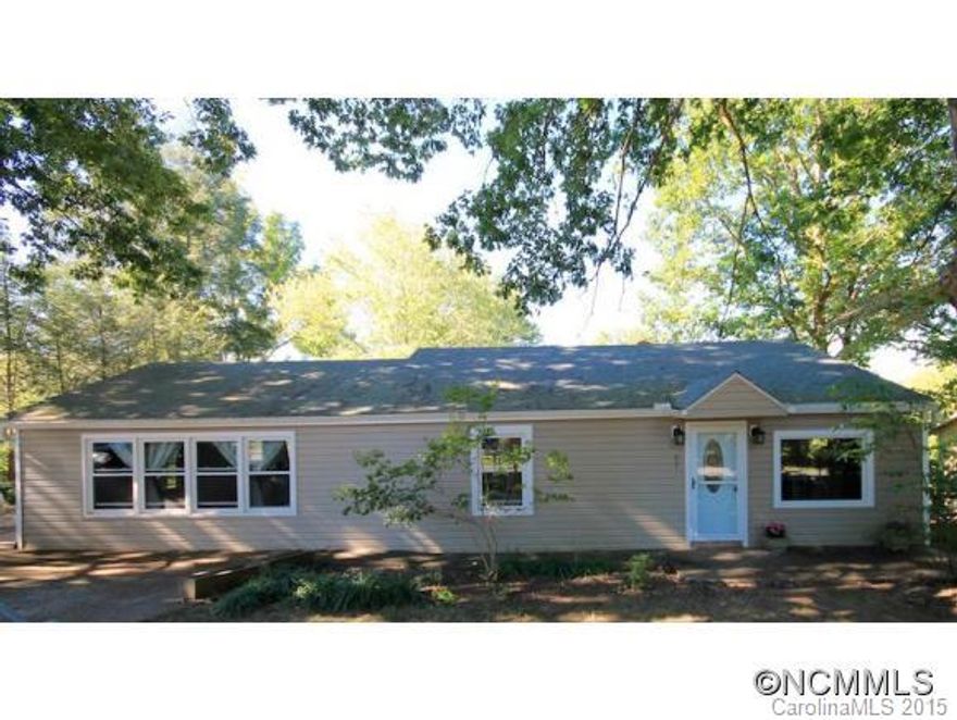 Good sized home in the heart of Woodfin & only minutes from downtown Asheville! In additon to its great location, the square footage & space will surprise you. Sit back & enjoy the peaceful back porch or have plenty of room inside for watching football with your friends in the large family room. This home has the potential you are looking for to place your own personal stamp. Location, price, size-it hits all the marks! Bring an offer today!