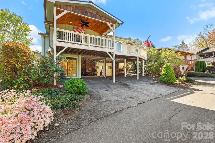 Ready to simplify your life? Check out this spacious mountain retreat in Linville Land Harbor's Mountain View neighborhood. This home features three bedrooms, three bathrooms, a family room, a great room, and a stunning, partially covered deck for a morning cup of Joe. The updated kitchen, eat-in island, and bathrooms make it move-in ready! The lower level features the 3rd bedroom, a full bathroom, and a sunroom. Note: Sunroom is not heated. The oversized heated one-car garage provides extra possibilities. Laundry and mudroom as well. Linville Land Harbor offers a variety of fantastic amenities, including golf, a clubhouse, a gameroom, seasonal recreation activities, pickleball, tennis, trails, dog parks, a pool, trout fishing, and a lakeside beach. The HOA covers water, sewer, trash, cable, and Wi-Fi. Furnished with a few exclusions. Experience mountain living at its finest! Do not let this one slip away!