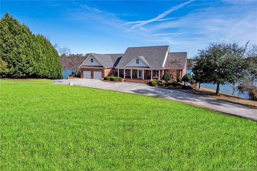 Incredible view! Wide expansive views of Lake Wylie. Waterfront, deep water, double covered boat dock with 2 lifts. Home features 4 Bedrooms each with own bath. Massive screen porch overlooking lake. Very large Rec Room with 2nd Kitchen. Lower Level has bedroom with full bath. Too many features to list. Priced to sell. Hurry this one will not last long!