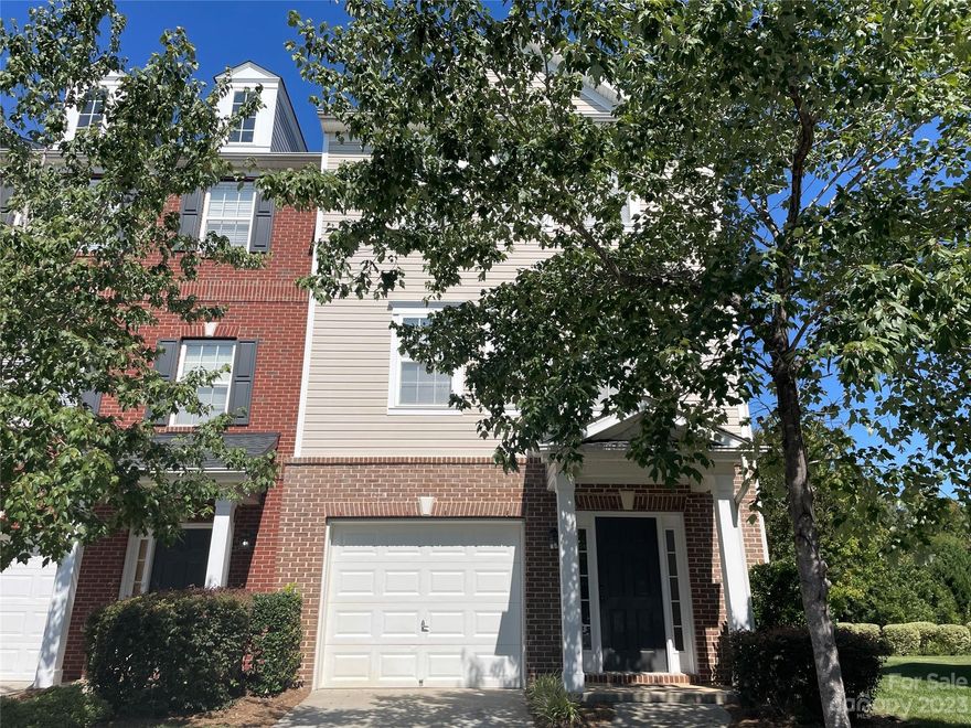 Large 3 story end unit townhome in desirable Moss Creek. Features include living room with gas fireplace, two balconies, and patio. Kitchen has breakfast bar, granite countertops, and tile backsplash. All appliances including the refrigerator, washer, & dryer convey. First level has 1 car garage, and a BR/bath suite. Upper level includes the kitchen, dining area, living room, and laundry room. Third floor has the two spacious bedroom suites w/walk in closets. (Floorplan available in the MLS documents). The HVAC system was installed in 2020, refrigerator in 2021. The HOA maintains the roof, siding, deck, & the yard.

There is a large greenspace to the rear, bordering that is a beautiful wooded area. Moss Creek offers too many amenities to list, including several pools, water slides, tennis courts, playgrounds, clubhouse, walking trails, etc. Neighborhood is very convenient to great shopping and dining, and a short commute to Charlotte or downtown Concord & Kannapolis.