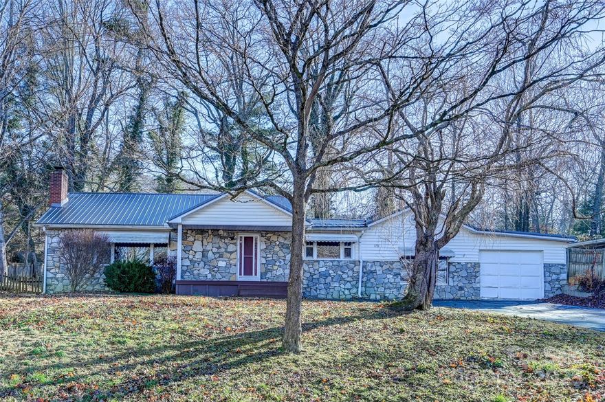 Motivated Seller!  $2000 credit towards buyer expenses!  Check out this beautiful stone front ranch home located in the highly sought-after Royal Pines area. Brand new HVAC system.  The large windows are great for letting in lots of natural light. The beautiful hardwood floors really add to the character and charm. The extra-large kitchen will come in handy for all your cooking needs. This home features one level living with minimal steps for easy accessibility. The very level large yard is perfect for pets, entertaining and all your outdoor activities. The one car garage is great for storing vehicles, workshop or any hobbies. It's conveniently located near restaurants, shopping, and only minutes to Asheville and the Parkway. We have priced it to sell!!