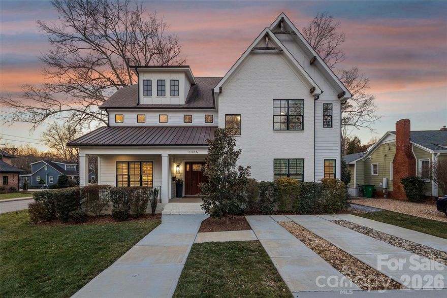 Stunning 5 bed /4 bath luxury home in the heart of Dilworth with inviting front porch and timeless curb appeal. This home offers a wonderful floorplan with seamless flow and elevated finishes. Wide-plank hardwood floors throughout the home, plantation shutters, amazing abundant natural light, 10 foot ceilings on main and 9 foot ceilings on upper level. The gourmet kitchen features an expansive quartz island and gas range, pot filler and custom hood, beautifully appointed butler’s pantry, equipped with a beverage refrigerator and bar sink connects to the kitchen through a walk-through pantry with built-in cabinetry, additional counterspace and floating shelves. Formal Dining and a sophisticated family room featuring coffered ceilings and tongue-and-groove detail. Gas fireplace enhanced by custom built-in shelving and an oversized sliding glass door that opens to a large covered rear porch—perfect for indoor-outdoor living. Two luxurious owner’s suites provide unparalleled flexibility, with one on the main level and a second on the upper level. Each suite features vaulted ceilings, designer lighting, large custom walk-in closets with built-in shelving systems and spa-inspired baths with dual vanities, freestanding soaking tubs, large tile surround walk-in showers. The main level primary suite features an ensuite laundry closet and the upper primary suite opens to a private covered terrace and offers dual walk-in closets. Spacious secondary bedrooms with walk in closets. Large hall bathroom with an oversized double vanity and a tile surround shower/tub combo. Great storage and closets throughout home. The third-floor offers endless possibilities for a home theater, executive office or large bonus room. Outdoor living is remarkable with paver patio, covered electronic retractable pergola with ceiling fan and built-in gas grill area with countertop and beverage refrigerator. Outdoor fireplace with custom built-in niches for storing wood. Dual parking pads - front and rear with electronic gate. Fantastic, flat corner lot. Excellent location with convenient access to SouthEnd and Uptown. Walking distance to shops, dining and parks. Subdivision is Sunset Hills in tax record but is commonly known as Dilworth. Construction began and tax year built date is 2018 but House Completion/CO date is 5/12/2020. Move-in ready and a wonderful opportunity!