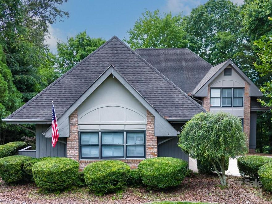 NO HOA! Tired of the cookie-cutter home? Designed and built by an architect from Asheville, this custom home is truly one of a kind. Designed both for entertaining and everyday living and sitting on an almost half acre of the #6 par 3 of the Pines at Tega Cay. From the moment you enter you feel the WOW! This home has open spacious living areas, a large kitchen with gracious amounts of both cabinets and counter space, quartz countertops and ss appliances. Large primary bedroom with attached office/nursery, and bath both on main level. Upstairs 2 br plus flex space/could be 4th bedroom(no window), full bath, loft, and walk in attic with tremendous storage or additional sq. ft. potential. The back covered porch and deck offer plenty of area to enjoy the privacy of the wooded fenced yard and golf course. So many special details you must see for yourself. (circular bath, open shelving, loft overlook of greatroom, kitchen garden window) You will truly be amazed by this home!