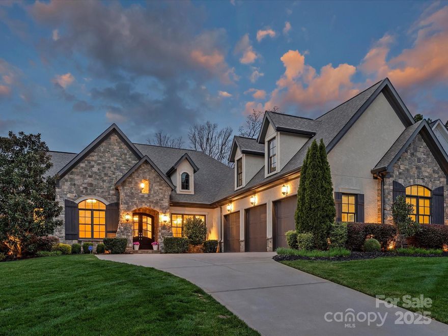 Exceptional executive-style custom home by Arthur Rutenberg. This meticulously maintained 2017 home has all the elements of luxury living. Enjoy sunsets in your saltwater pool (2023) with sun shelf and in-pool chaise loungers. Hardscaping includes a Techo-Bloc wall, fire pits, Trex decking, and adjustable custom lighting. Bring the outside in with stacking glass patio doors off the expansive screened porch. Inside, the chef’s kitchen boasts a large island/breakfast bar, Dacor 6-burner gas cooktop, double ovens, Sub-Zero refrigerator, Bosch dishwasher, plus secondary refrigerator in walk-in pantry. The main-level Primary suite offers pool views, and a zero-entry wet room. Also on the main: an office, formal dining, large laundry room, and 2 bedrooms en suite. Upstairs features THREE entertainment spaces: a large rec room w/ wet bar, gaming/movie room, and a bonus lounge off the 4th bedroom. The 3-car garage has epoxy flooring and large built-in cabinets. Generator, surround sound.