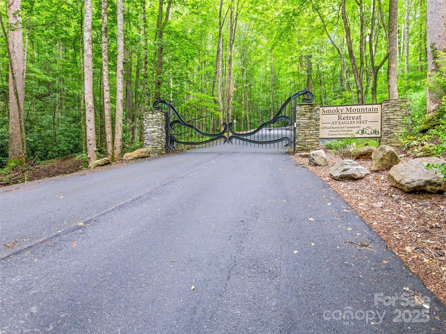 Discover the perfect canvas for your dream home on this beautiful 1.93-acre lot! The homesite is cleared, with a septic system already installed (no permit found) and city water hookups available. Nestled in a scenic community that blends comfort and nature, enjoy access to a wide variety of amenities including serene walking trails, peaceful creeks, playgrounds for the kids, and tranquil ponds. Whether you're looking for privacy, convenience, or outdoor recreation, this lot offers the best of all worlds.