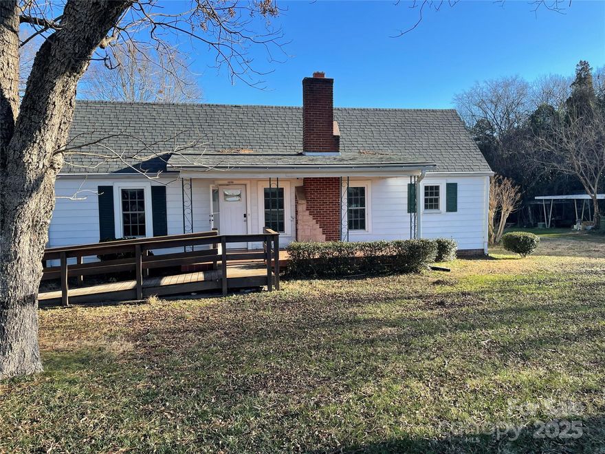 Endless potential in a prime location just off I-85! This 2-bedroom, 1-bath home offers approximately 1,490 sqft of living space on a half-acre lot. The property features a formal dining room and a flexible bonus room-ideal for home office, den, or future business use. Currently zoned residential, the location is surrounded by expanding commercial and mixed-use development, making it a perfect candidate for rezoning to support your business or investment goals. This property is being sold as-is, with no repairs by the seller. Highlights: excellent visibility near I-85 and Jake Alexander Blvd, expanding commercial corridor with high growth potential, half acre lot with room for parking or future improvements, zoned residential-ideal for commercial conversion (pending rezoning), convenient access to  shopping, dining, and major highways. Located minutes from downtown Salisbury and easy access to I-85 for travel between Charlotte, Greensboro, and Winston Salem. Call today to take a look!!