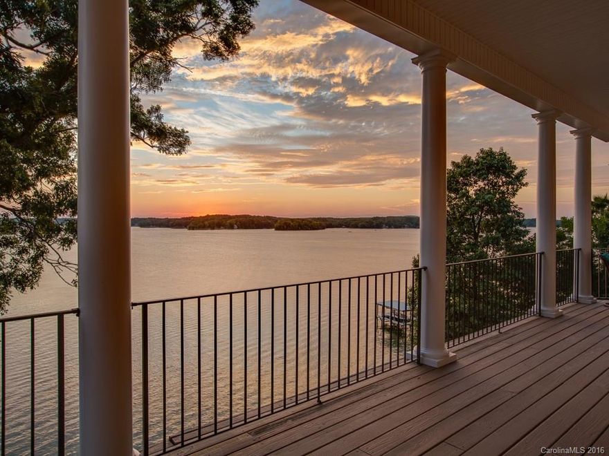 This Tega Cay waterfront home will "WOW" you with its long-range panoramic sunset views of the main channel. Relax in the lakeside saltwater pool and spa, hone your skills on the putting green, and lounge on the huge covered porches overlooking the lake. Gorgeous architectural details throughout, with stone fireplaces in the great room & master. Main level master w/ luxury bath, dream walk-in closet/dressing room. Rec room w/ kitchenette, bar trimmed in gorgeous stone. Covered dock and lift.