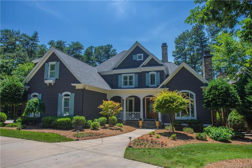 Casual lake style...beautifully updated w/refinished hardwoods, judges paneling, wet bar, kitchen w/ granite & quartz counters, owners suite bathroom, new mahogany front doors, garage doors & more. Outdoor features salt water pool, spa, pool house w/bath (529 sq ft possible 5th bedroom) outdoor kitchen all add to the perfect place to entertain. Enjoy outstanding sunsets from screened porch or open deck. Shoreline flanked w/stone steps for easy access to lake. Start living the lake life today!