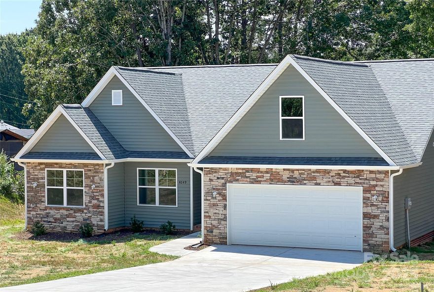 Welcome to this beautifully maintained 4-bedroom, 2-bath ranch-style home nestled on over half an acre in a prime location — minutes from Indian Trail, Matthews, Weddington, Wesley Chapel, and Waxhaw! This home features an open floor plan with a spacious living area, granite countertops, stainless steel appliances, and a breakfast bar in the kitchen. The primary suite boasts a large walk-in closet and a private en suite with a stunning tile shower. Enjoy outdoor entertaining with a large fenced-in backyard, covered patio, and a huge driveway with parking for 6+ vehicles. No HOA means more flexibility. Schedule your showing today — this one won’t last!