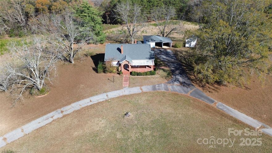 REDUCED! Just 6 miles from the Heart of Chester, this home AND  46 ACRES with a "stream" at the rear of the property is ready for a new owner.  The roof and the HVAC is less than 10 years old.  Although only 2 Bedrooms, there is 2 very large rooms that were used as a Living Room and Den.  Use your imagination---the Den could be converted to a 3rd bedroom or opened up to make a larger kitchen area! Sold As Is, but has been Professionally cleaned inside--all but the carpet.  Lots of Potential! Beautiful brick exterior & architecture W/ wrap around front porch! The listing including the house, garage, storage buildings, wood sheds and rear garage workshop.  Seller has been advised that there is Timber value for Pine and Oak Hardwoods but no guarantee of value.  Possibly great hunting grounds on the land,  but check with Chester County zoning for ALL restrictions--Zoned R2. Call for more information.  This is also listed under LAND by MLS#4071753. Virtual tour is available by request.