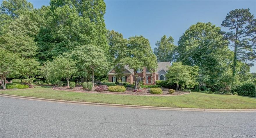 Beautiful Hardwoods downstairs and in the upstairs hall. Master on Main with master bath with jet tub and separate shower. Formal Dining Rm, Family Rm open to Kitchen w/ island, solid surface counter top, gas range, microwave, dishwasher, disposal, Laundry room on main level. Upstairs has three Bedrooms, Large Bonus/Bedroom and a media room.