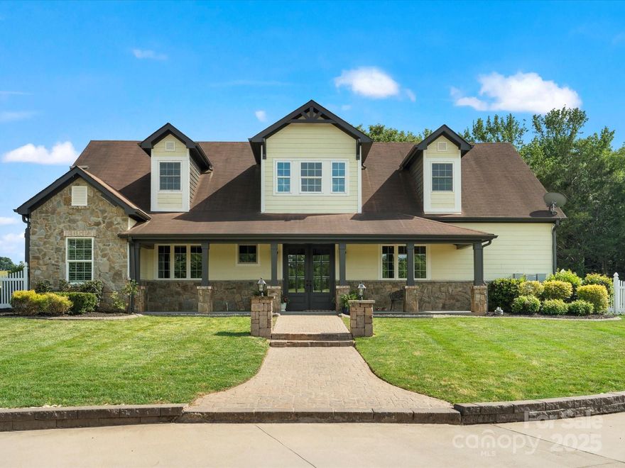 One of a kind secluded sanctuary built by Classica Custom Homes overlooks 10 picturesque acres. Stunning 5 bedroom, 4 bath, open floor plan offers a gourmet kitchen w/quartz countertops, KitchenAid appliances and huge walk in pantry. The large family room has a wood stove fireplace, french doors that lead to a beautiful terrace & patio with outdoor kitchen, dining area, fire pit and stone bench seating. Main level Primary Suite has large walk in closet, vaulted ceiling and custom trim work.  Main level also features a private bedroom/office space. Upstairs has substantial living area plumbed for a full kitchen, including walnut counter tops and gorgeous views of the property. Two large bedrooms each with ensuite baths, include cozy built in sleeping areas with work stations, one with a private balcony to take in the view. Love to garden? Get your hands in the dirt and find serenity in the amazing garden! Irrigation system. This home is a true retreat just minutes to the city.