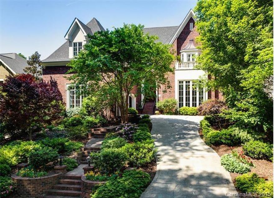 Top of line materials used to build this exquisite showplace, designed by Jim Phelps. Brazilian Cherry floors, pewter bath fixtures, stained glass, French doors, travertine tile, custom built-ins & lighting, 2 FP, dual gourmet kitchen, 2 screen porches, mud room, potting room, sun room, secret passage to safe room, as well as many built-in IT and automatic sound & security systems. Flex room could be 5th bedroom. Outside offers heated pool, spa, herb garden, gas grill, playhouse, garden.