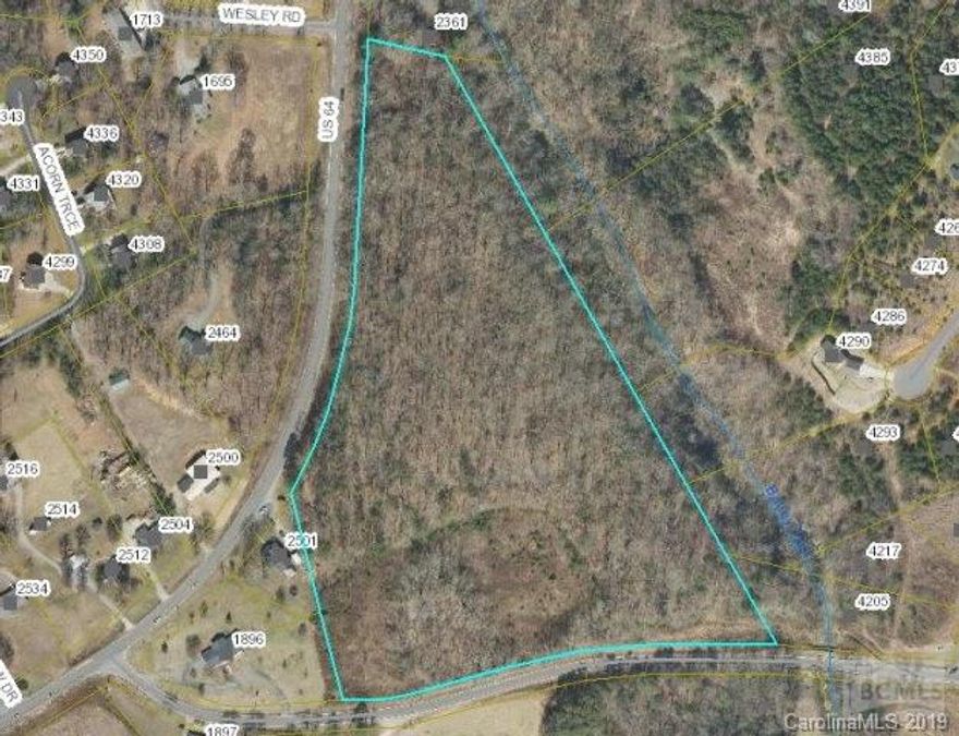 Beautiful wooded gently rolling property consisting of approximately 15.3 acres in the Salem Community. Perfect for single family home or many other uses. Entered as a Comp only.