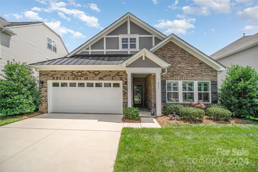 Experience the pinnacle of ranch-style living in this extraordinary home situated in the highly sought after Avalon Subdivision. With over 2100 square feet of pure elegance, this residence is more than a mere home; it's a masterpiece deserving of a magazine spread. Vaulted ceilings enhance the sprawling open floor plan flooded with natural light. Admire the sunroom & charming shutters throughout! Gourmet kitchen beckons culinary adventures with an elegant oversized island. 4 bedrooms, including a majestic primary suite boasting vaulted ceilings and lavish bathroom with a luxury shower & seating bench. Ascend to the half story to discover an oversized bedroom with bathroom & loft, offering unparalleled privacy. Fully fenced backyard and patio, ensures serenity and seclusion. Impeccably maintained and move-in ready, this home offers unparalleled comfort & luxury. Minutes from everything Downtown Mooresville has to offer! Prepare to be enchanted—this is ranch living at its finest.