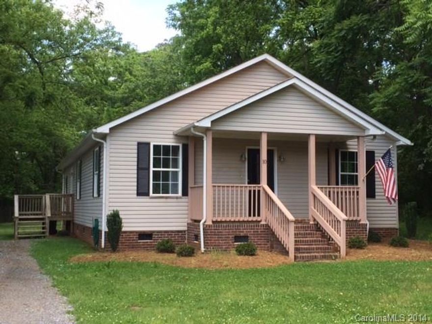 COMPLETELY REMODELED RANCH HOME! New stainless steel appliances, granite counters, carpet, tile floors, kitchen faucet, door hardware, paint, lighting, driveway & landscaping. MOVE RIGHT IN! Vaulted ceilings in kitchen, living & dining rooms. Luxurious master bath w/jetted tub. Ceiling fans thruout. Huge flat backyard. Rocking chair front porch!  USDA financing available.