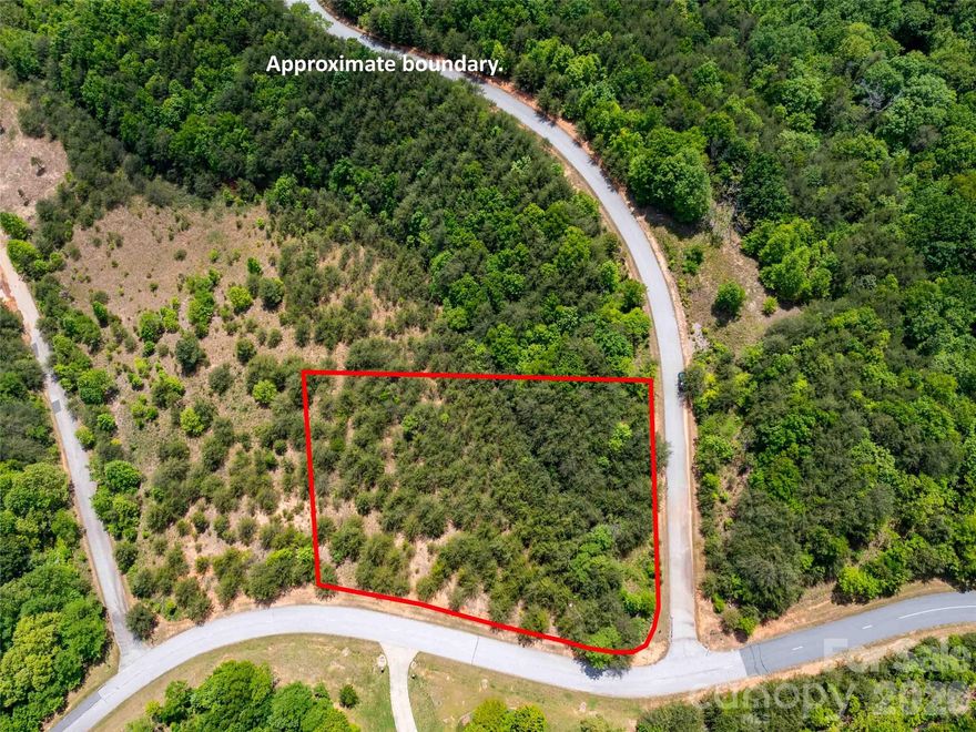 Great Lot in Brights Creek Golf/Equestrian Development. Brightss Creek Golf and Equestrian community is a beautiful development with paved roads, fiber optic, water, sewer, & natural gas. Community offers 24 hour staffed greeters cottage and beautiful walking trails including a waterfall trail. Equestrian facility features boarding, lessons, trail rides and more. Membership available to Bright's Creek Club that offers the Members Grille, Tom Fazio designed golf course, tennis, and pickleball. The new amenities include outdoor heated saline pool, two lane bowling alley, fitness, beautiful indoor & outdoor gathering spaces, and a casual dining option with full bar. Book a discovery tour today.