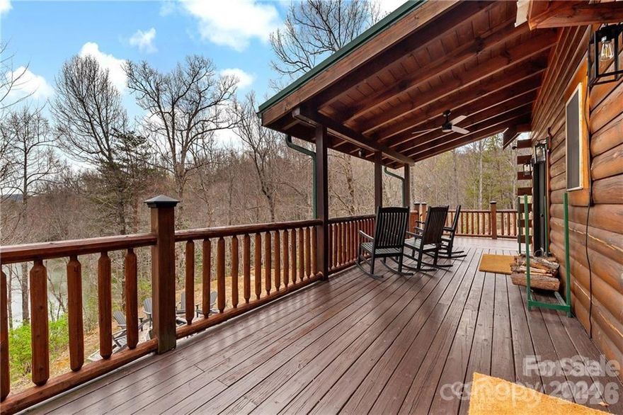 Fully furnished lakefront mountain retreat in the sought-after Gateway Mountain community! Nestled on 1.9 acres, this gated community spans over 3,000 acres and allows short-term rentals, making it an excellent opportunity for a vacation home or income-producing rental. Overlooking serene Lake George, the property features a private dock, tool shed, and a stunning firepit area with a gravel path and steps to the water. Extensive 2022 upgrades include quartz countertops, stainless steel appliances, updated bathroom fixtures, and stylish light fixtures and ceiling fans throughout. The fully stocked kitchen and furnished interiors make this home truly turnkey. Enjoy the peaceful mountain setting while being minutes from adventure. Don’t miss this rare opportunity—schedule your showing today!