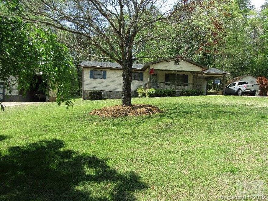 Relax on your covered front porch or in the gazebo around back! This home is beautiful & offers 3 beds & 1.5 baths on .45 acres. Hardwoods though out home including under the carpet (per owner). The gas fireplace in the living room is perfect for a cold winter night while the large deck and gazebo in the back yard are ready for your summer bbq's! This home features 2 out buildings, both have electric and offer a generous amount of storage. There is ample parking for those summer parties. Don't wait..this home will not last long!!