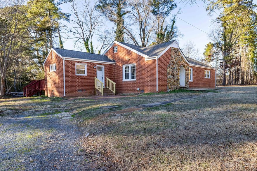 Be the first to live in this beautiful newly renovated 4BR 2BA brick home, situated on over an acre of land. This home features an open floor plan, newly remodeled kitchen with stainless steel appliance beautiful backsplash, plenty of counter space, new flooring throughout, generous size bedrooms, a gorgeous back deck, and a sunroom to enjoy relaxing, reading a book or sipping your morning coffee. This is a must see and will not last. So hurry to schedule a showing today.
