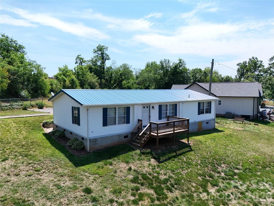 Welcome to a home that delivers comfort, space, and convenience all in one.

Featuring 3 bedrooms, 2 full bathrooms, and 1,456 sqft of well utilized living space, this property sits on a .26 acre lot just moments from the heart of Morganton, giving you the perfect balance of privacy and accessibility.

Step inside to find durable LVP flooring flowing throughout the main living areas, creating a clean, modern feel that is both stylish and low maintenance. The open living and dining space offers plenty of room to gather, while the kitchen stands out with an abundance of cabinetry, giving you all the storage you could need along with a functional layout that makes everyday living easy.

Both bathrooms have been tastefully updated with tile finishes, including a spacious walk in tiled shower and a separate soaking tub that adds a touch of comfort and relaxation.

Outside, the lot provides usable yard space with room to enjoy, entertain, or simply unwind, all while being just a short drive into town for dining, shopping, and everyday essentials.

If you have been looking for something move in ready, low maintenance, and close to everything Morganton has to offer, this one checks the boxes.