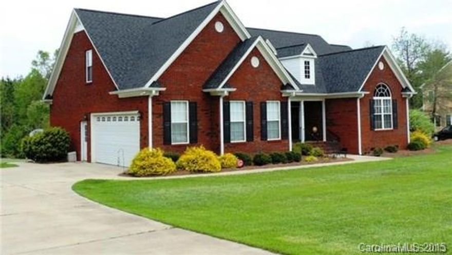 This Immaculate & well maintained full brick Ranch w/ bonus upstairs has it all. Hardwood floors in most of main floor, Huge kitchen features gleaming granite countertops, upgraded cabinets galore, SS appliances, double trey ceiling in Dining room. Spacious Great room with vaulted ceilings, & gas FP, lot's of windows. Large deck, from rocking chair porch. Sits on 1 acre lot.