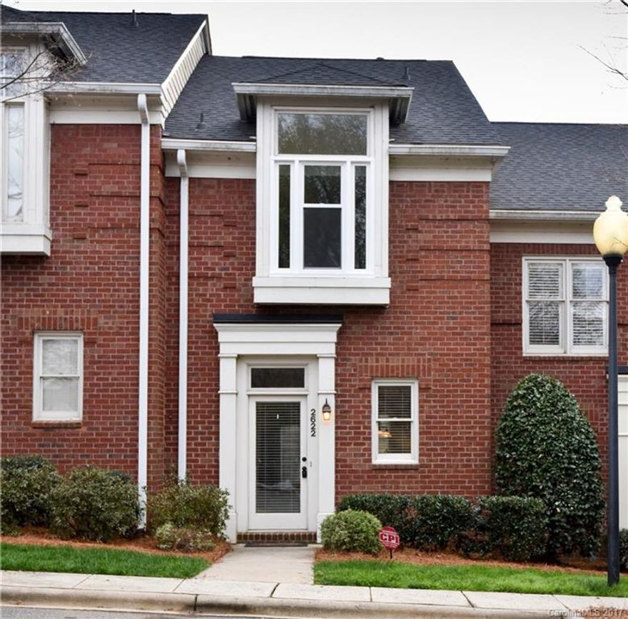 Amazing full brick condo available in Dilworth Heights! Open concept floorplan has hardwoods running through main level. Kitchen hosts white cabinets, granite counters, recessed lighting and SS appliances. Living room features gas log fireplace and tons of natural light. Bedrooms upstairs both have huge closets and attached full bathrooms. Enjoy the outdoors with privacy on the enclosed patio with storage shed. Freshly painted! Washer, dryer & fridge remain! Close to lots of shops & restaurants!