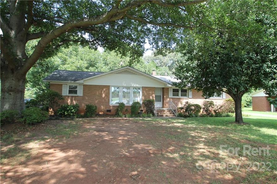 Cute Brick House Located in Rock Hill, SC, 3 Bedrooms, 2 Bathrooms, Large Formal Living Room, Dining Room, Large Eat In Kitchen with Range, Refrigerator & Microwave. (China Cabinet can stay or be moved), Den Area off of Kitchen. Laundry Room (off of Den) with Washer & Dryer. Great horseshoe Driveway and Large Carport with Shop (Lean-To off of back of Shop). Nice Sitting Area with 2 concrete benches in back yard. Lots of Rose Bushes. Single Family Only.
No Smoking/No Vaping. No Pets. By Appointment Only (Available January 16, 2023).