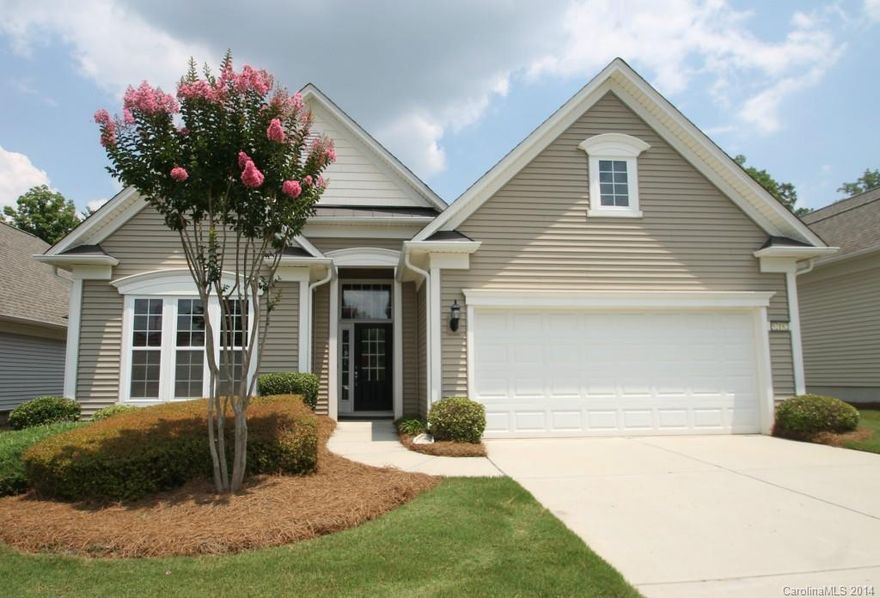 Willow Bend Model on Fabulous Private Lot! Gourmet Kitchen with Maple Flat Panel Cabinets, Granite Countertops, Ceramic Backsplash, Island, and Breakfast Nook with Built-In Desk. Wood Floors Throughout Foyer, Kitchen, Breakfast Nook, Great Room & Office. Upgraded Carpet in Bedrooms with Tray Ceiling in the Master. Tile in Bathrooms. Irrigation System! Move-In Ready! Amenities Galore in this Active Adult Community!