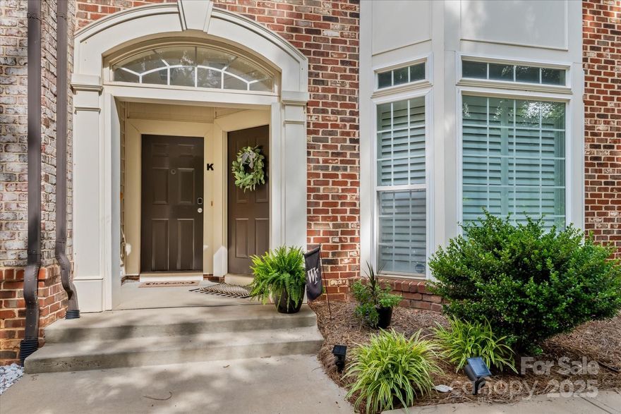 Experience the best of South End & Uptown living from this stunning 3-story brick condo with an attached garage, tucked away on a quiet, tree-lined street! Enjoy an open-concept layout w/ high ceilings & abundant natural light.The living room is highlighted by crown molding, a bay window & gleaming wood floors, while the kitchen features granite countertops, a brand new tile backsplash & electric range, SS appliances, & an island, beverage bar—perfect for everyday living.Upstairs, the oversized owner’s suite boasts a tray ceiling, 2 walk-in closets, & ensuite bath.Two more spacious bedrooms share a full bath w/ a double-sink vanity. Newer carpet & fresh paint give the entire upper level a clean, modern feel.The conveniently located laundry room offers extra storage w/ built-in cabinetry. Additional highlights incl. a large 1-car att. garage, an assigned parking space, free parking & unbeatable access to the Light Rail & trail, restaurants, breweries, & music venues—vibrant urban living right at your doorstep!