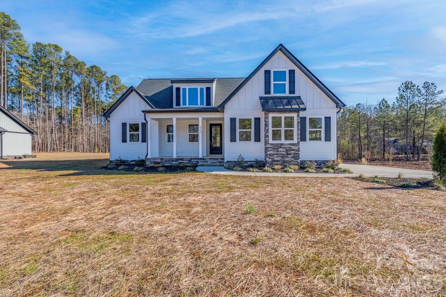 This new construction home, located on 1.3 acres, is ready for you!  With three bedrooms and two bathrooms on the main level, this well-designed home features luxury vinyl plank flooring.  The kitchen, with quartz countertops, stainless appliances, and island overlooks the family room that is equipped with an electric fireplace, providing warmth and character to this home.  The primary suite is a great retreat with bedroom, walk-in closet, and private bath with double vanity and tile shower.  The upper level is home to a large bonus room, office, and full bath.  The potential for this space is unlimited – work from home, guest quarters, etc.… Enjoy the storage space with great closets and attic space.  The white Hardie plank and stone veneer provide a beautiful and timeless exterior.  Enjoy your morning coffee or relax at the end of the day on your choice of covered porches on the front and back of this beauty.  Outside the city limits, yet in close proximity to access to I-77, this one has much to offer.  Come make 2159 Dunlap Roddey Road your next address and enjoy the comfort and privacy it provides. Please note that the builder is planning to re-grade the rear yard and overseed everything the first of spring.