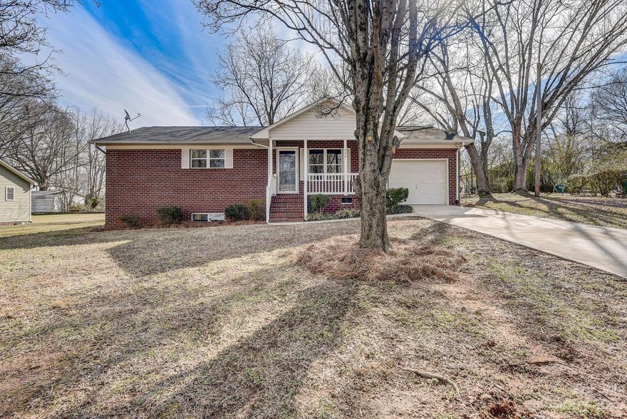 Rare opportunity to find a home that is BOTH move in ready AND has significant opportunity to add value! This downtown Landis gem boasts 2 beds, 2 full baths AND 1,000 square feet of unfinished basement that can lead to endless possibilities!  This home has a new water heater, new stove, new microwave, fresh paint and more.  The charming front porch is the ideal to start your day with a cup of coffee, while the backyard is a haven for entertaining with a patio that is perfect for gatherings and grilling.  The real treasure lies in the basement, a versatile space with a full bath and a separate entrance, ready to be transformed into extra bedrooms, a home theater, a gym, or a potential rental unit! Additional storage is found in the garage, complemented by a convenient pull-down attic. Close to I-85, ensuring easy commuting and access to nearby amenities!