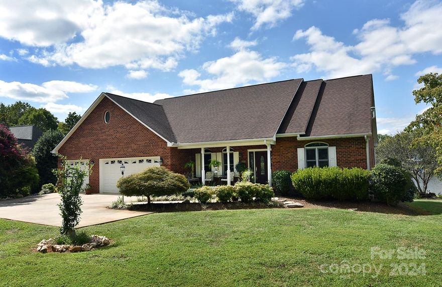 Welcome to lake living at High Rock Lake. This beautiful Custom-built Lakefront home is located within Waterford Pointe community & has a most magnificent view of sunsets on the lake. The main level boasts a stunning kitchen w/stainless steel appliance, granite counter tops, breakfast & living room w/open floor plan, separate dining room off of foyer, main level laundry room & 1/2 bath. A large lakeside screened porch scans back of home & opens to outdoor deck & stairway down to beautiful backyard, lake area & firepit. Main level primary BR with his/her walk-in closets, private bath w/jet tub & separate walk-in tile shower. Fully finished lower level/walk out basement features family room, billiards room, 2 BR's, 1 full bath, unheated exercise room, music/media room & lots of storage. Walk-out basement opens to a relaxing covered patio perfect for entertaining & enjoying lake life. The 3-car attached garage is perfect for 2 cars & a boat. Community boat ramp & boat/trailer storage area