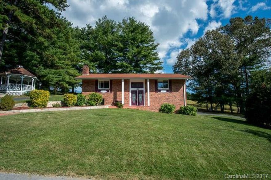 This brick home is a rare find: move-in condition in a pastoral setting yet moments from downtown Hendersonville.  In addition to the bedrooms and bath on the main level, the basement has a spacious family room that could be a downstairs master suite.  You'll love the crown molding, hardwood and tile floors, patio just off the kitchen, and a lovely gazebo that is perfect for entertaining.