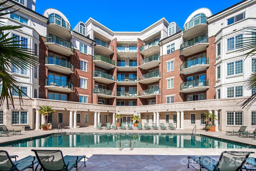 Just in time for Spring & Summer!  Spend days by the pool sunbathing, swimming, grilling and hitting a few balls on the putting green!  If you are traveling this summer, the ease of living in this 2 bed 2 bath modernized split layout home at sought after 5th and Poplar, is perfect! Lock and go! The concierge will hold your packages and mail till you return! This beautifully updated open concept home features new quartz kitchen countertops and back splash, soft neutral toned LVP flooring, new stainless steel appliances, lighting and ceiling fans.
The light filled airy space extends through sliding glass doors to the balcony that is perched above historic Settler's Park. The perfect spot to enjoy your morning coffee, check your emails, or unwind at days end! The primary bedroom's casement windows bring nature indoors making the room serene & cozy. The second en-suite bedroom makes a perfect home office/tv room or dedicated bedroom with walk-in closet.  Both bathrooms have new quartz countertops & toilets. 

New Samsung appliances, quartz sink, ceiling fans & lighting. Walk in pantry/laundry with new stackable LG washer/dryer. Secure deeded parking. Meticulous homeowners replaced water tank & HVAC condenser 2023, window hardware, sliding door rollers & hardware. 

Located in the Fourth Ward, 5th & Pop is just blocks from all the sports stadiums & arenas, dining, museums, theatre, the light rail and situated between parks. Be privy to Friends of Fourth Ward events especially the highly anticipated Secret Garden & Home Holiday Tours!

Building updates: New roof 2023, hall carpet & paint 2022. No planned assessments. 

LIVE THE TURN KEY RESORT LIFESTYLE AT 5TH & POPLAR: FULL TIME ON SITE CONCIERGE & AWARD WINNING ON SITE HOA management., pool w outdoor kitchen, professionally landscaped gated courtyard w putting green, fountain, dog park, state-of-art fitness center, cozy library w gas fireplace, fireside terrace w TV & grills, media room, cyber & coffee cafes&  resident car wash. 2 full time supers & maintenance staff, HARRIS TEETER, NAIL SALON & DRY CLEANERS in the building. Digital bulletin board.  On and off site activities including Book Club, Coffee & Conversation, Happy Hours, Bingo & More!