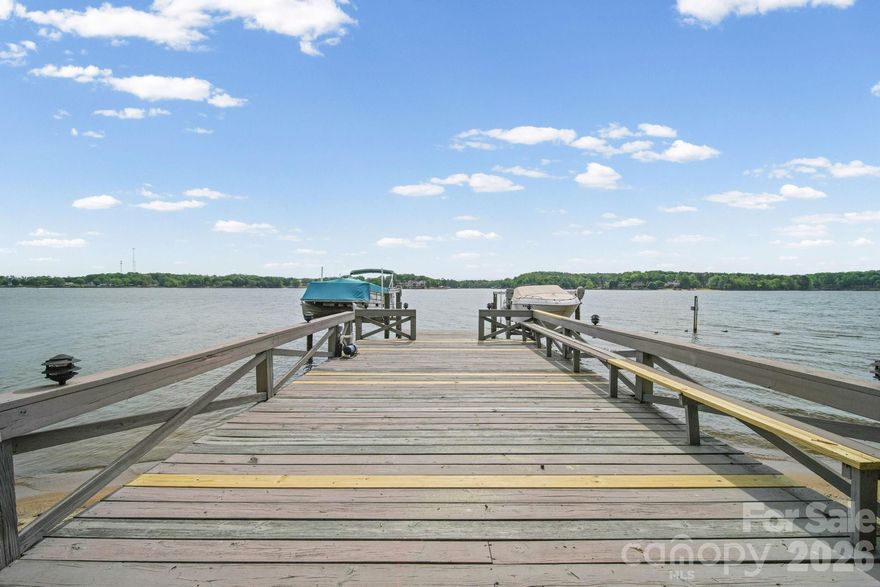 Welcome to an exceptional waterfront retreat in the highly sought-after gated community of River Hills on Lake Wylie. Privately tucked away on a quiet cul-de-sac, this 2-bedroom, 2-bath home showcases a bright, open floor plan designed for effortless entertaining, with stunning lake views and a striking stone fireplace serving as the centerpiece of the living space.
The expansive primary suite offers a serene sitting area and direct access to a screened-in porch overlooking the water—creating the perfect setting for morning coffee or evening relaxation. Thoughtfully designed for both comfort and functionality, the detached 2-car garage features a separate flex space ideal for a private office, fitness room, or studio.
River Hills offers an unparalleled lifestyle with a private golf course, lake access, and a wide array of amenities, all within a secure, gated community. This is more than a home—it’s a lifestyle defined by comfort, elegance, and the beauty of Lake Wylie living.