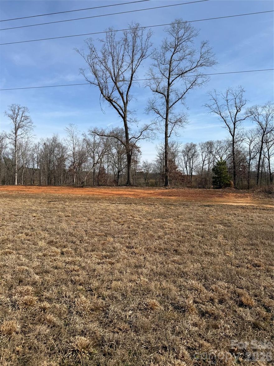 1.29-acre buildable lot, perked for a 3-bedroom home. Minimum required square footage is 1,850. No HOA restrictions. Conveniently located near downtown Monroe with easy access to shopping, dining, and entertainment. Great opportunity to build with space and flexibility close to town.