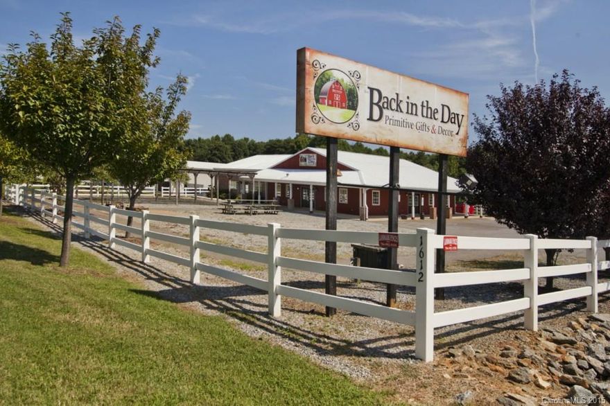 Zoned B-N. Approx. 3,880 sf, one story building w/ two retail counters, kitchen, men's/ladies restrooms, a
private owners office suite complete w/ full bath. The spacious interior has beautiful stamped concrete flooring
and custom wood molding which makes for a very warm decor. Just minutes from the majestic Lake Norman.
This is an innovative & affordable solution for any growing business. A sound investment! Our online photos
show many examples of what this property is capable of!