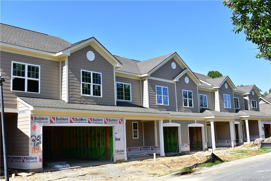 Spacious open floor plan with large kitchen island.  All bedrooms upstairs as well as a loft.  The large master suite has a tiled walk-in shower with seating, dual vanities, a water closet and huge walk-in closet with a pass thru to the laundry room.  Kitchen features granite counter tops, tile backsplash, hardwood floors and stainless range, microwave and dishwasher.