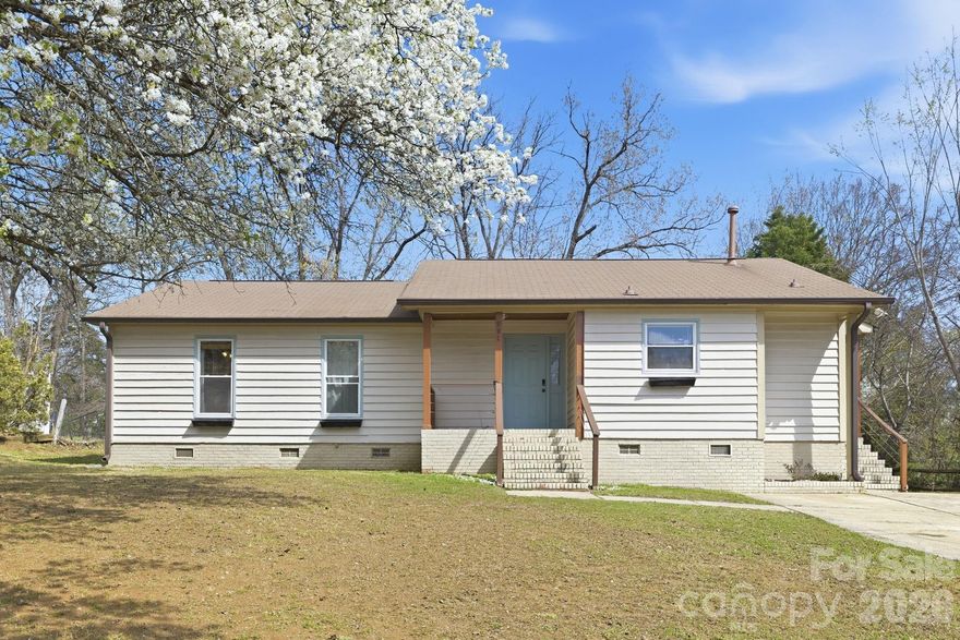 Welcome to your dream ranch home in Charlotte! This inviting 1,550-square-foot residence offers 3 bedrooms and 2 full bathrooms -hall bathroom features a brand-new tub, all freshly painted and MOVE-IN READY. The open-concept layout perfectly suits modern living complemented by the charm of a wood burning fireplace. The bright white kitchen gleams with stainless steel appliances, leather granite countertops, a convection double oven, and an oversized fridge—perfectly flowing into the dining area, ideal for entertaining. Hardwood floors grace the main living areas and the master bedroom, where you’ll also have your walk-in closet. A large pantry and spacious laundry room, complete with washer and dryer, add extra convenience. Outside, enjoy a generous backyard, a large deck, and a screened-in porch. Plus, with no HOA, you have all the freedom you need. Conveniently located near Ballantyne, I-485, Novant Health Pineville Hospital, the airport, and just a short drive to Uptown, this home is a true must-see!