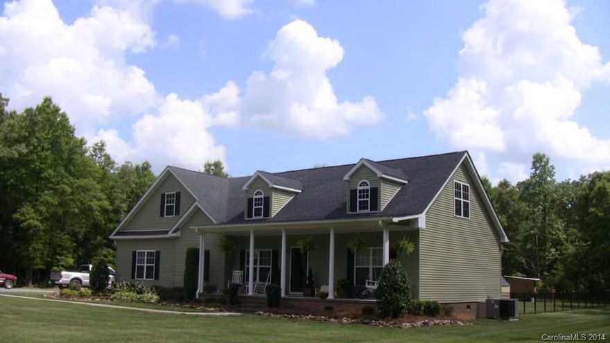 OVER 4 ACRES 5 MILES TO MONROE, ISLAND KITCHEN, WALK IN PANTRY, STAINLESS APPLIANCES WALL OVENS, BAR SINK PASS THROUGH TO GREAT ROOM, COMPLETE WITH HARDWOOD FLOORS OPEN TO DINING ROOM, AMAZING BACK DECK WHICH FLOWS INTO THE STUNNING WROUGHT IRON FENCED BACK YARD AREA. SPLIT FLOOR PLAN ON MAIN LEVEL, ROCKING CHAIR FRONT PORCH, MASTER WITH CUSTOM WALK IN CLOSET FLOOR TO CEILING CABINETRY, DUAL VANITIES, SEP BATH AND SHOWER, CORNER GARDEN TUB, RECESSED LIGHTING, LARGE SECONDARY BDRMS TONS OF STRGE!