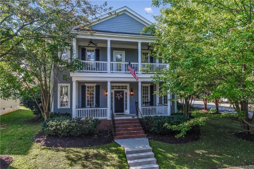 Great Charleston style home w/the Southern charm of double-front porches & nestled in the "Historic" section of Baxter. An estate corner lot w/mature streetscape, this home is one block from Baxter Community Center and Music on the Green. Stunning hardwood floors on main, updated kitchen w/large island, double oven, gas cooktop & open floor plan. 10' ceilings on main add to the elegance & space of the home with crown molding throughout all rooms & all levels. Custom master closet. Move in ready.