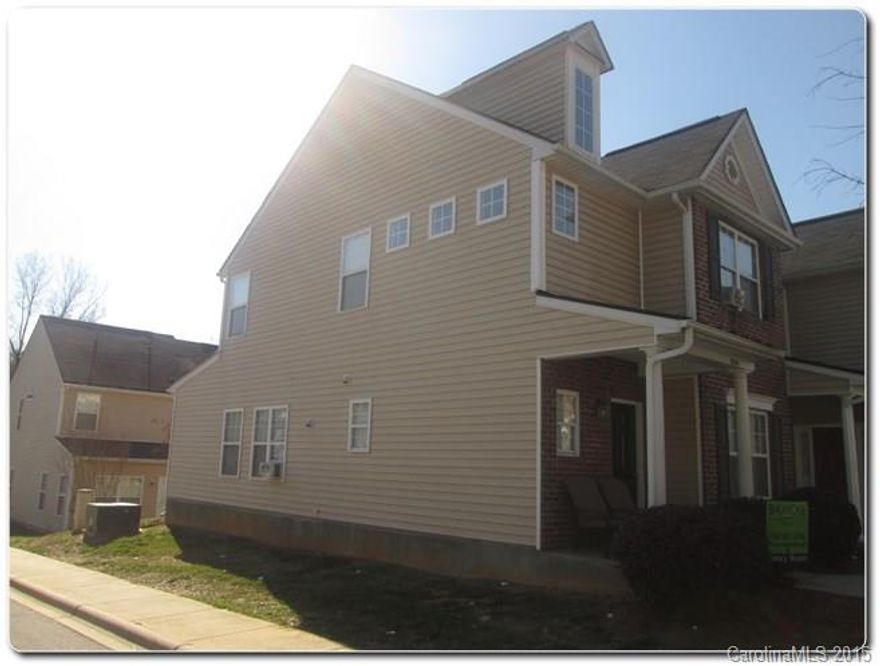 This is a great opportunity for investment! Desirable end unit has loads of natural light.  Lovely curb appeal with professional landscaping and rocking chair front porch. Master suite on main floor.