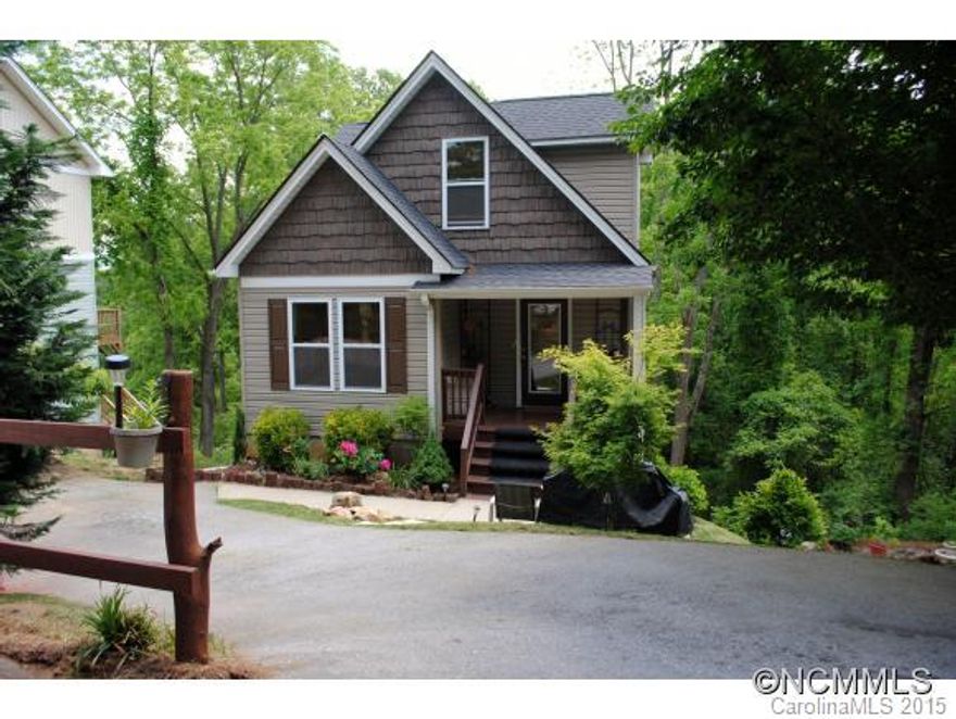 Highly desired Oakley area <1 mi to Biltmore Village! This 3/2 home was built in 2006 and offers a bedroom and full bath on the main level plus 2 bedrooms and full bath up. Hardwoods in living areas and kitchen. Decks on both main and basement levels overlooking private and treed back lot with winter views! Basement offers a professionally installed wood burning stove, laundry, office area, and room to play!