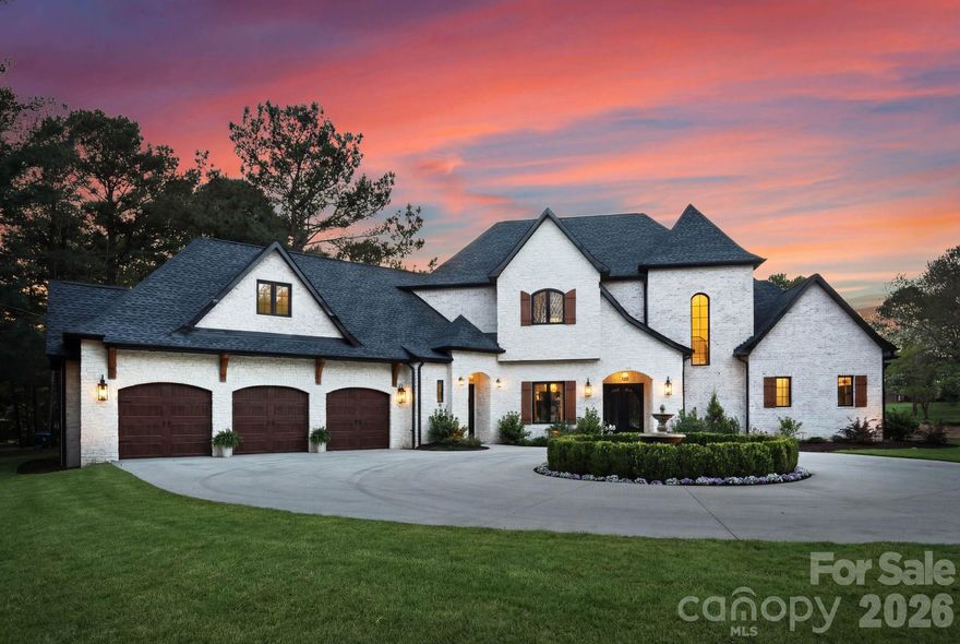 Luxury meets location in this stunning newly built home on 1.62 acres in Queens Cove near Langtree/Lake Norman. Designed with both elegance and comfort in mind, this residence welcomes you with beautiful European tile and an airy open floor plan highlighted by soaring ceilings and abundant natural light. Every detail showcases exceptional craftsmanship, featuring premium natural materials including limestone, oak hardwood floors, marble, and custom European tile in the mudroom. At the heart of the home, the chef’s kitchen is a true showpiece complete with quartz countertops, a gas range, soft-close cabinetry, and a walk-in pantry, perfect for both everyday living and entertaining. The primary suite offers a serene, spa-like retreat designed for ultimate relaxation. Each additional bedroom includes its own private en-suite, thoughtfully designed with distinctive custom tile, giving every space a unique character. Enjoy the flexibility of optional HOA membership along with convenient lake access. This home truly offers the perfect blend of luxury living and the lake lifestyle.